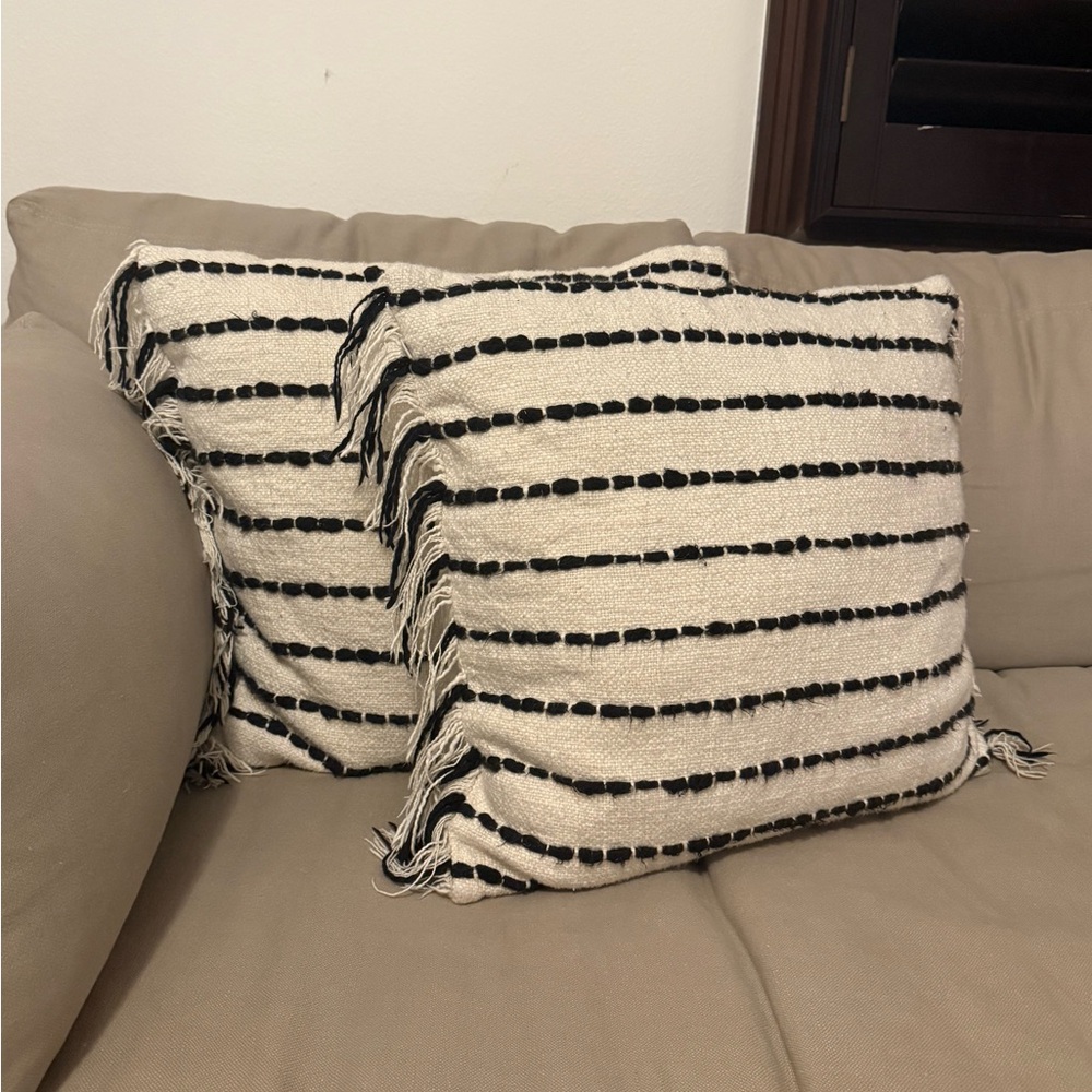 Black and white striped throw pillows